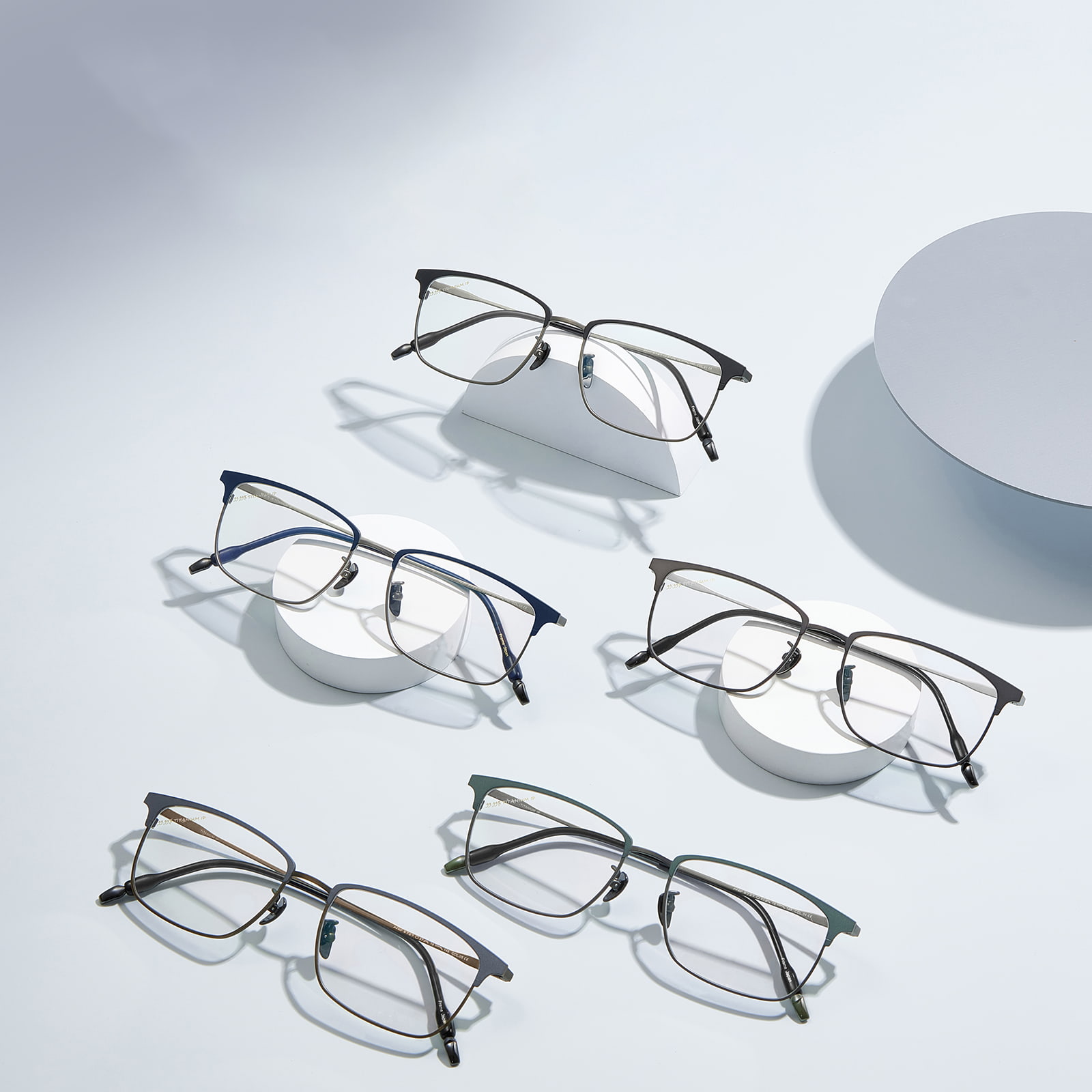 Lunettes en titane pur à monture ultra fine bicolore 9727 en forme de sourcil