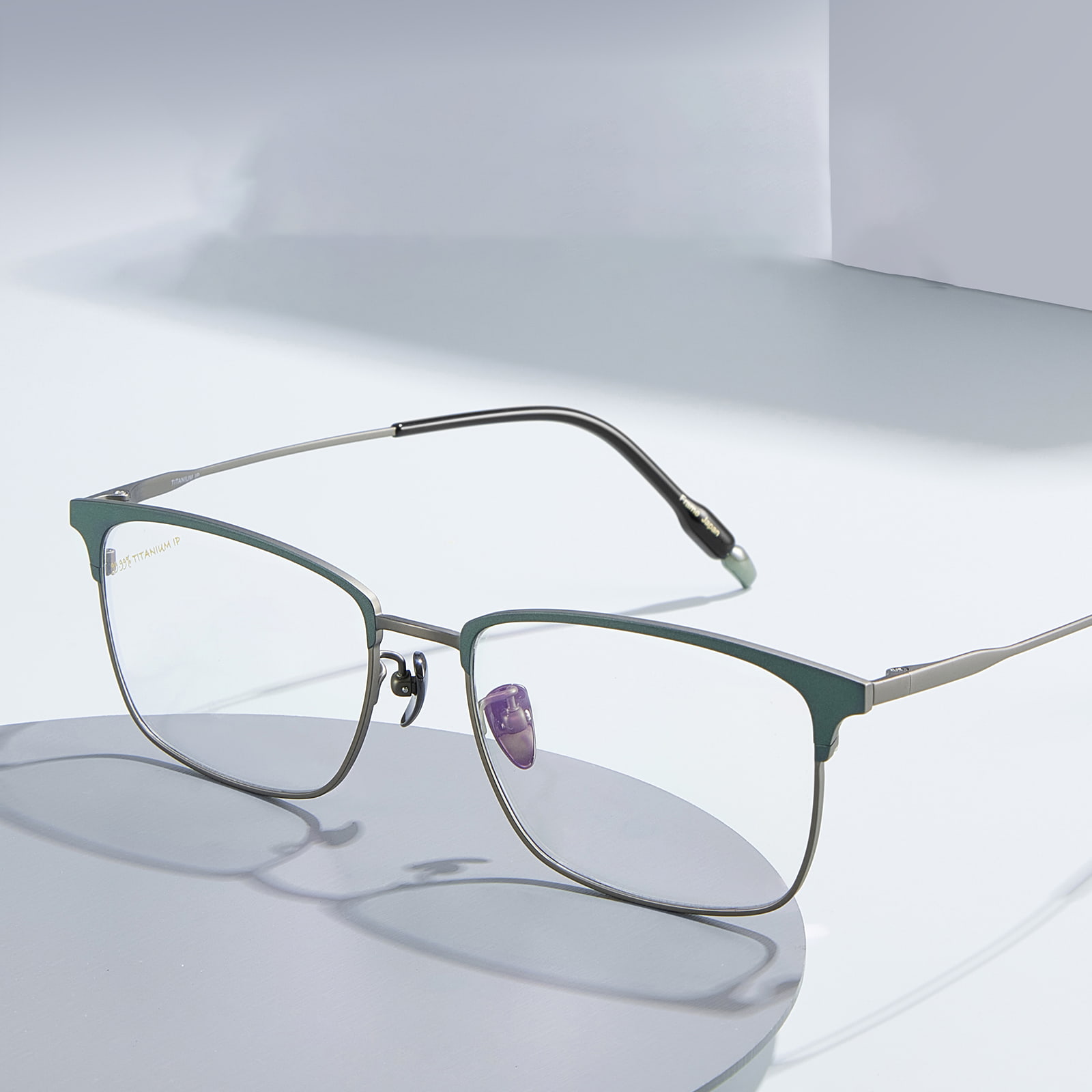 Lunettes en titane pur à monture ultra fine bicolore 9727 en forme de sourcil
